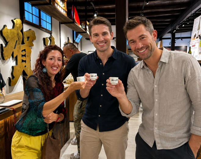 Sake tasting and brewery tour in Saijo, Hiroshima Ione, an English speaking guiding visitors on a sake brewery tour in Saijo, Hiroshima